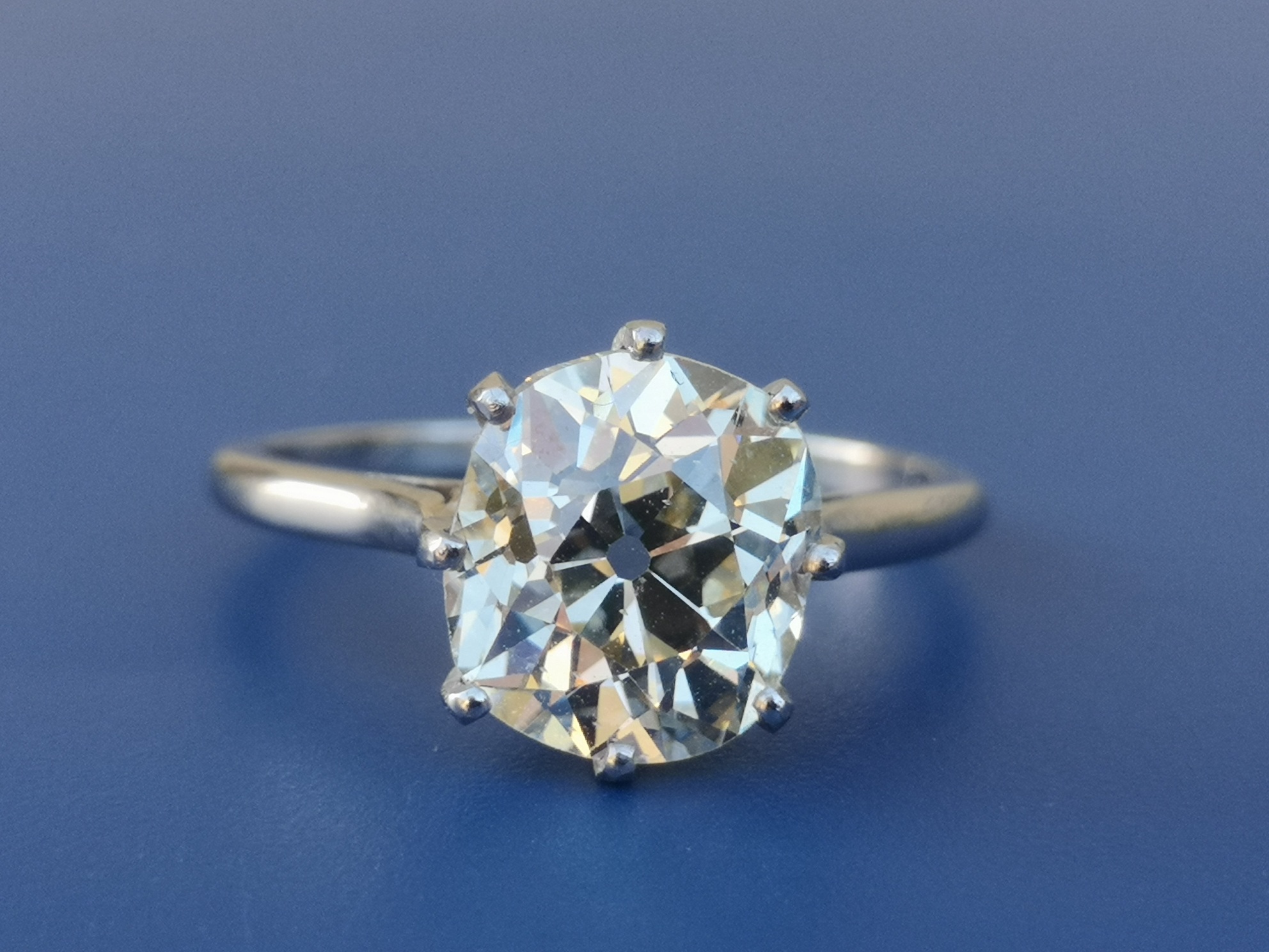 A certified 3.75 carat light yellow diamond solitaire for £7,500.
