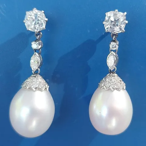  Pearl and diamond drop earrings £10,000