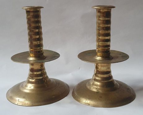 Pair of 17th C brass trumpet candlesticks sold for £2,100
